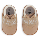 Chaussons souples en cuir de mouton BOSS 
                    UNISEXE