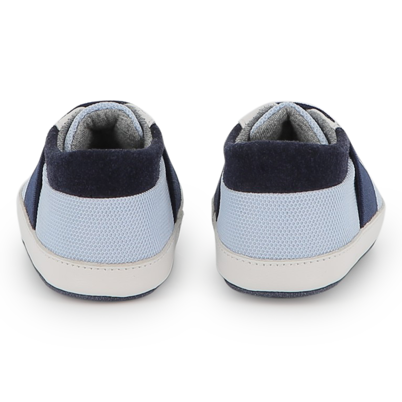 Zachte pantoffels van schapenvacht BOSS 
                        UNISEX