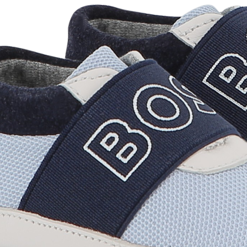 Zachte pantoffels van schapenvacht BOSS 
                        UNISEX