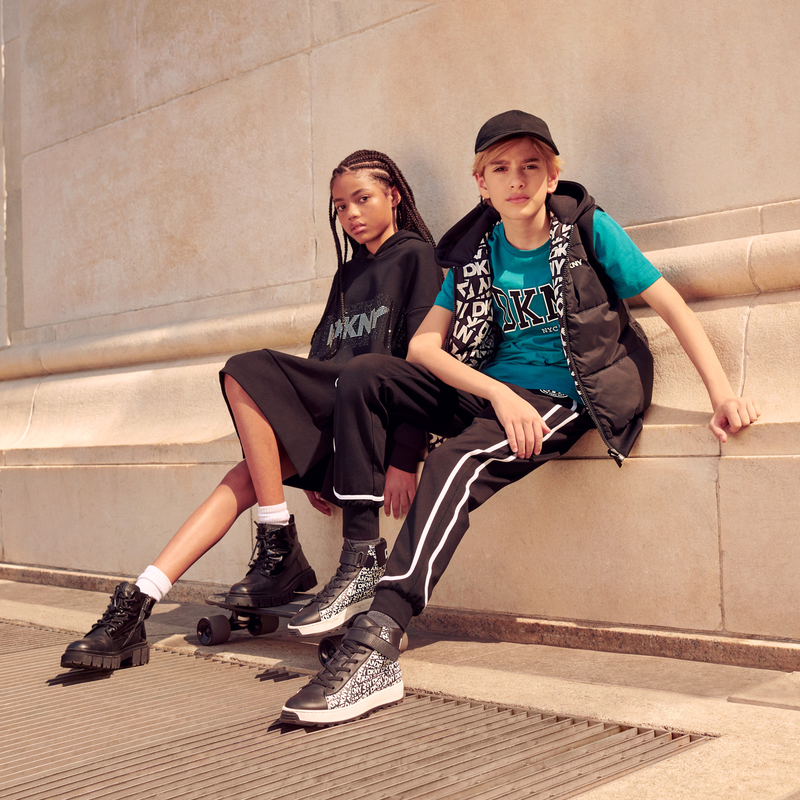 Doudoune sans manche &agrave; capuche DKNY 
                        UNISEXE