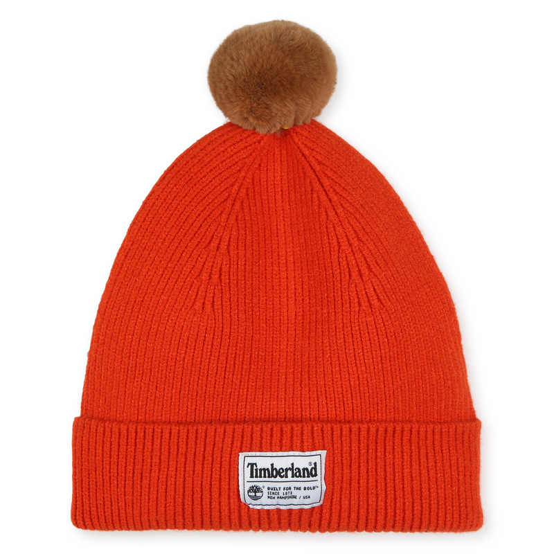 Gebreide muts met pompon TIMBERLAND 
                        JONGEN