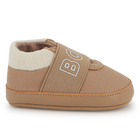 Chaussons souples en cuir de mouton BOSS 
                    UNISEXE