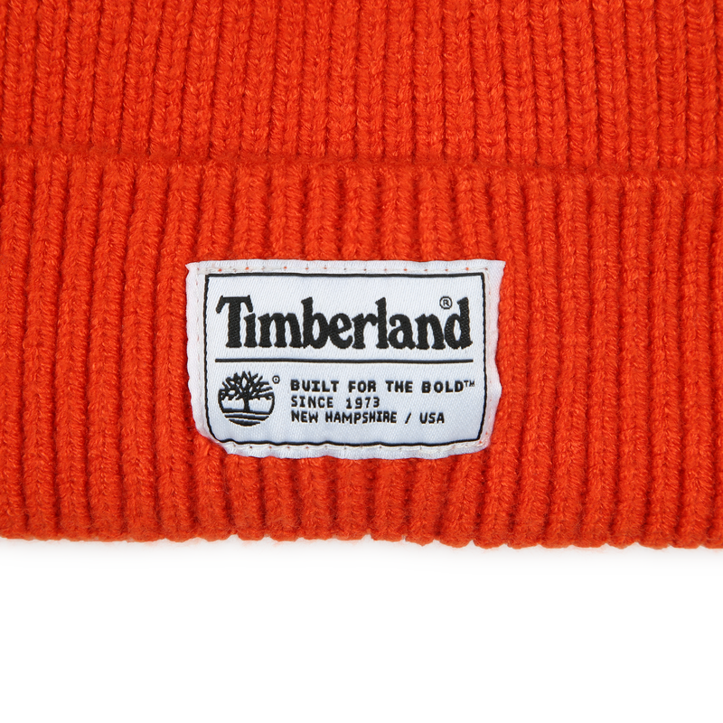 Gebreide muts met pompon TIMBERLAND 
                        JONGEN