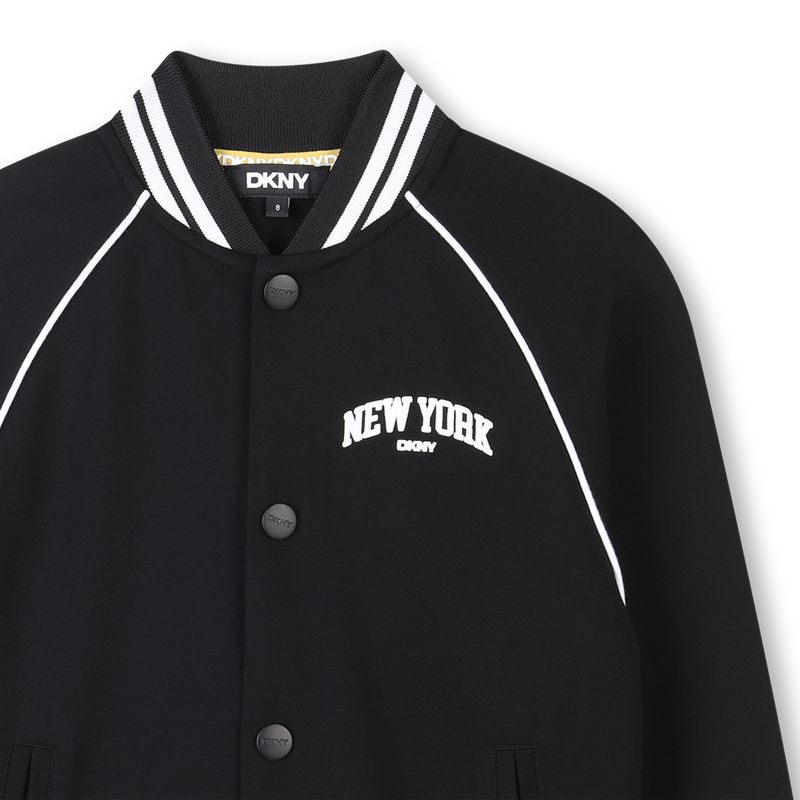 Veste sigl&eacute;e &agrave; pressions DKNY 
                        UNISEXE