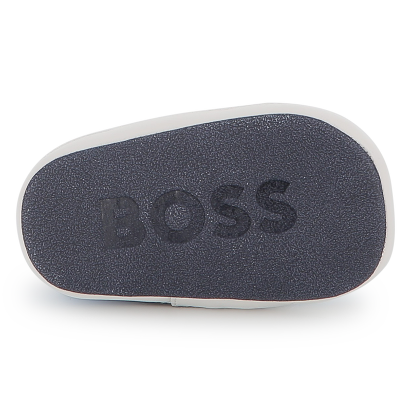 Zachte pantoffels van schapenvacht BOSS 
                        UNISEX