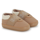 Chaussons souples en cuir de mouton BOSS 
                    UNISEXE