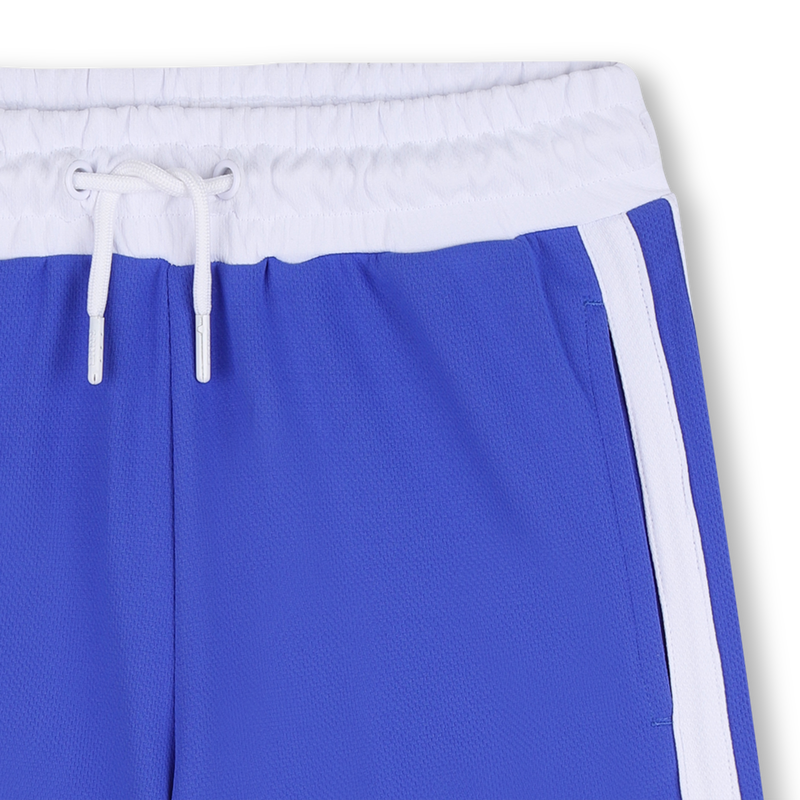 LANGE KORTE BROEK DKNY 
                        UNISEX