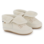 Zachte pantoffels van schapenvacht BOSS 
                    UNISEX