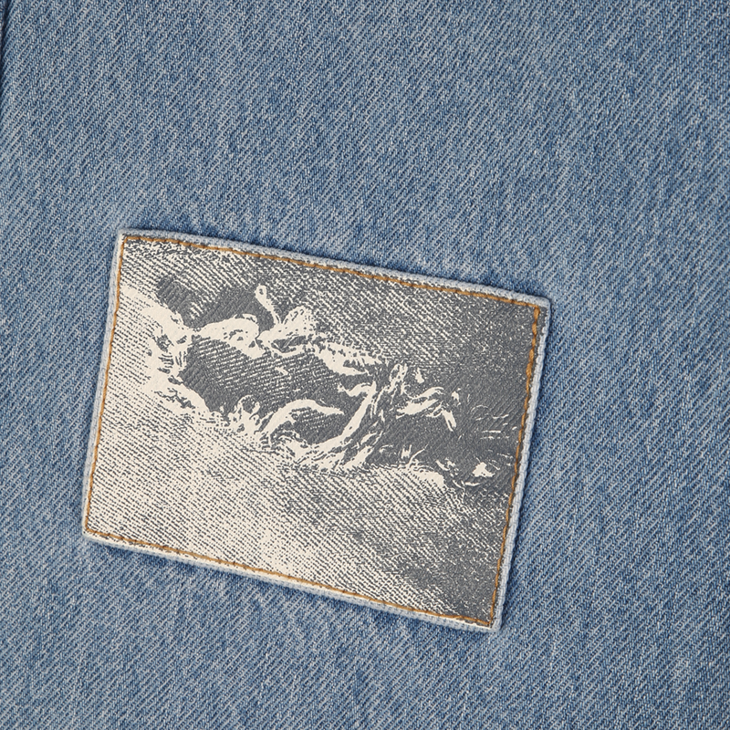 SHORT EN JEAN MARC JACOBS 
                        GARCON