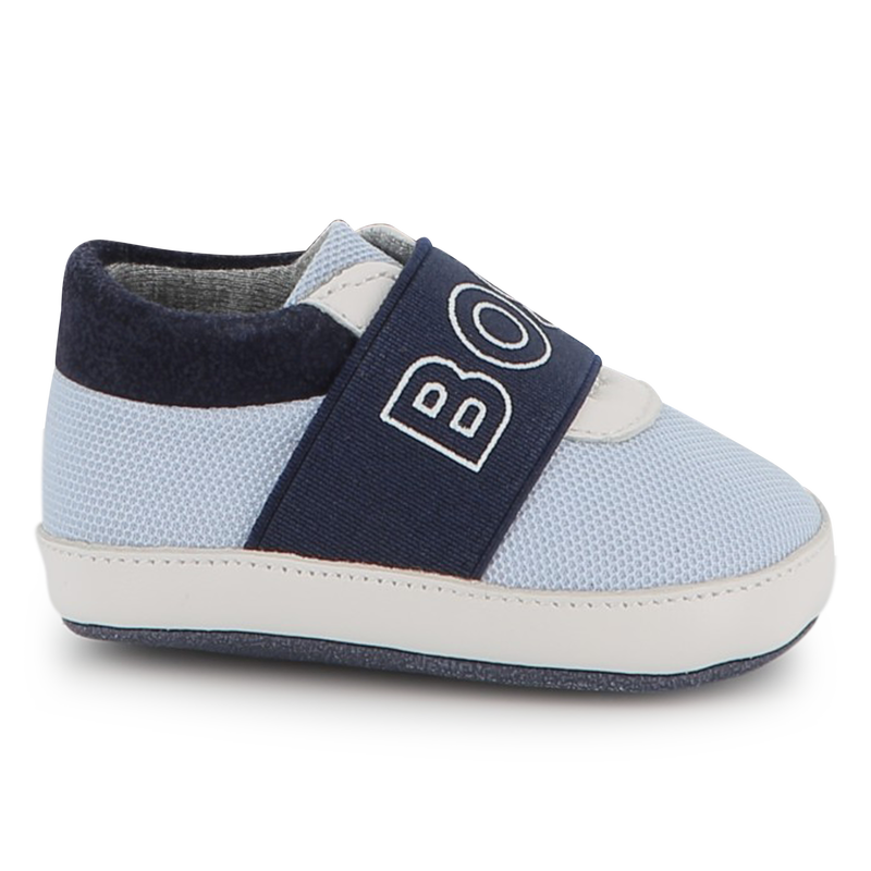 Zachte pantoffels van schapenvacht BOSS 
                        UNISEX